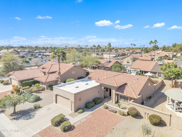 aerial view featuring a residential view and a mountain view