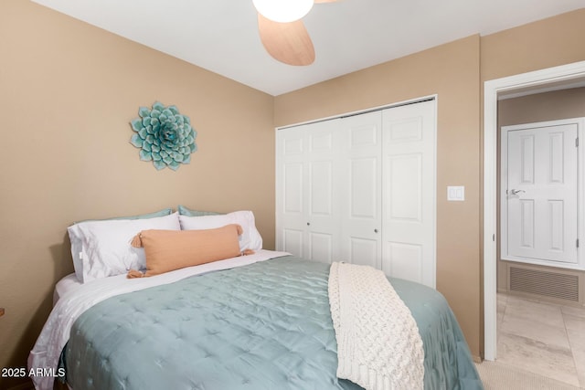 bedroom featuring a closet and visible vents