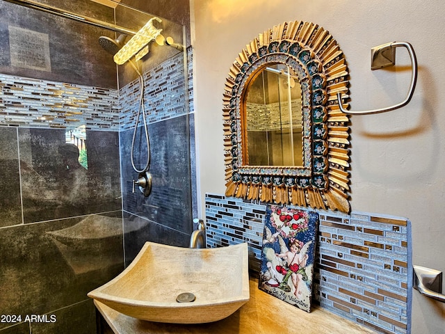 bathroom featuring a tile shower