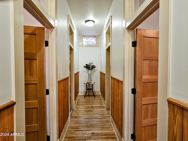 hallway featuring hardwood / wood-style flooring