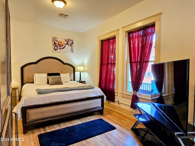 bedroom featuring hardwood / wood-style flooring