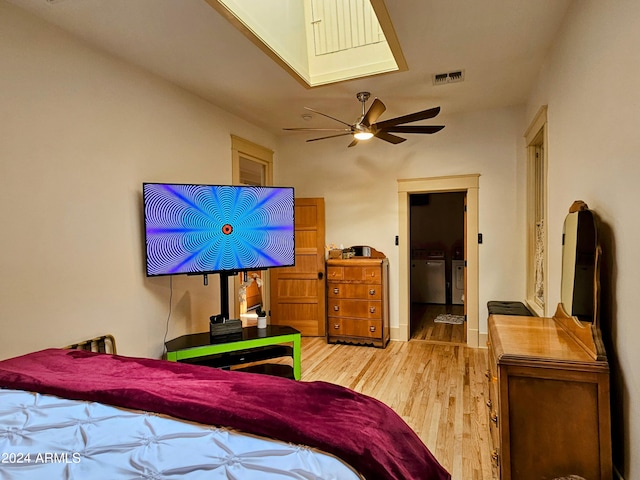 bedroom featuring ceiling fan and light hardwood / wood-style flooring