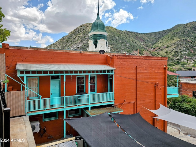 view of building exterior with a mountain view