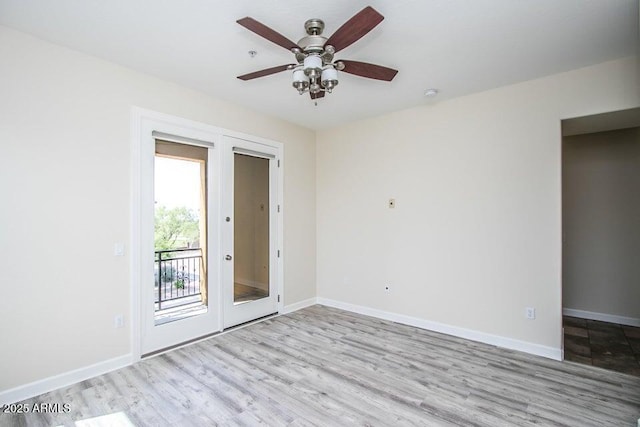 20750 N 87th St Unit 2103, Scottsdale, AZ 85255 - spare room with wood finished floors, ceiling fan, baseboards, and a smoke detector