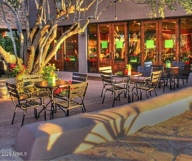 20750 N 87th St Unit 2103, Scottsdale, AZ 85255 - view of patio featuring outdoor dining space and french doors