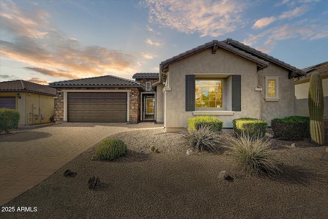 view of front of home with a garage