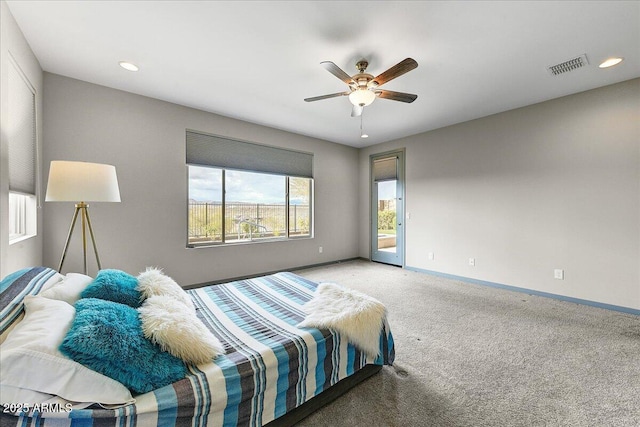 carpeted bedroom with access to exterior and ceiling fan