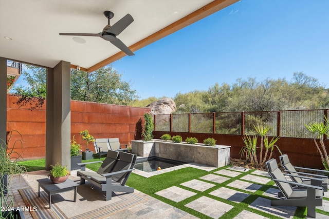 view of patio / terrace with ceiling fan