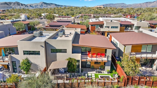 birds eye view of property featuring a mountain view