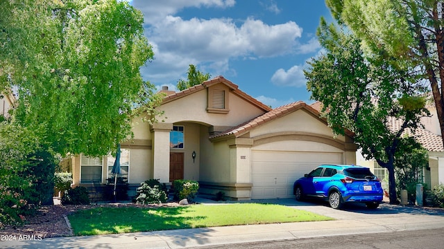 view of front of property featuring a garage