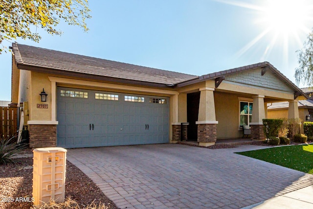 view of front of home with a garage and covered porch