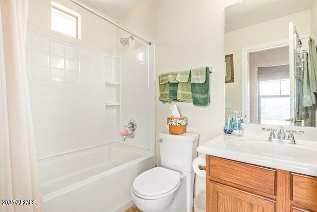 full bathroom with vanity, toilet, and  shower combination