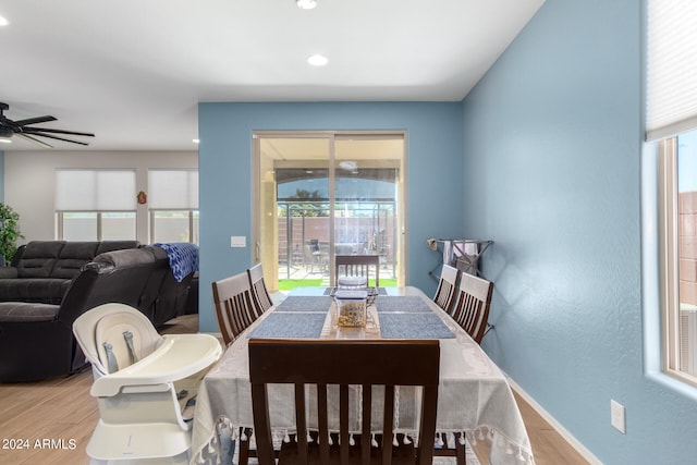 dining area featuring plenty of natural light, ceiling fan, and hardwood / wood-style floors