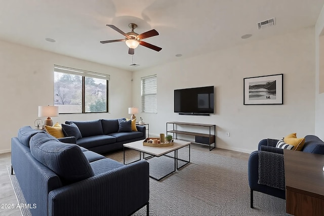 living room featuring ceiling fan