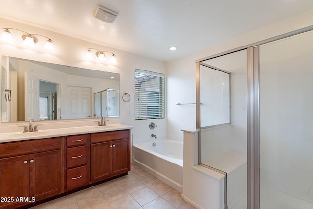 bathroom with vanity, separate shower and tub, and tile patterned floors