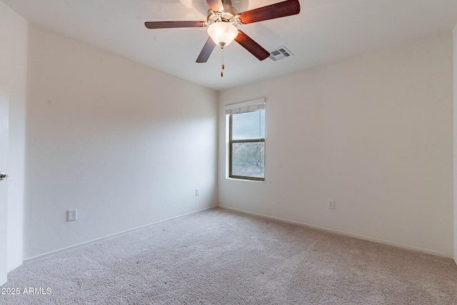 carpeted empty room with ceiling fan