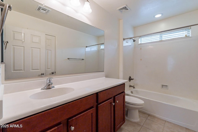 full bathroom featuring vanity, toilet, tile patterned flooring, and shower / bathing tub combination