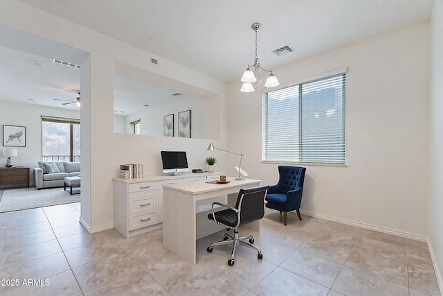 office space featuring light tile patterned floors and ceiling fan