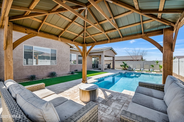 view of swimming pool with a patio, a fenced in pool, an outdoor living space, a fenced backyard, and a gazebo