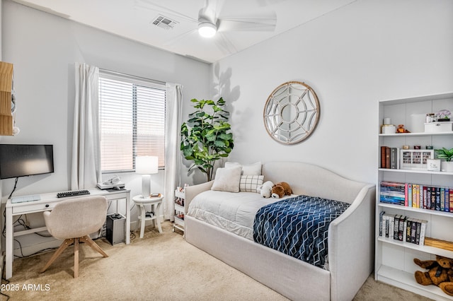 bedroom featuring visible vents, ceiling fan, and carpet floors