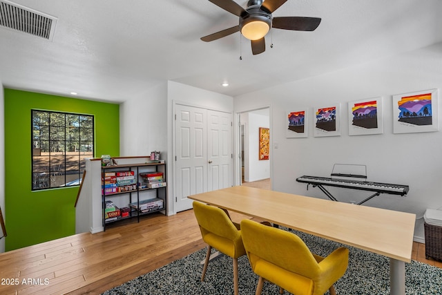 home office with ceiling fan and wood-type flooring