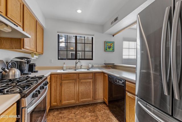 kitchen featuring appliances with stainless steel finishes and sink