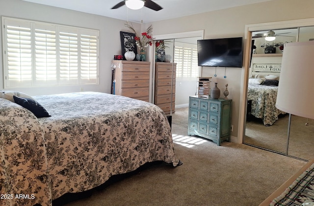 bedroom featuring light carpet, a closet, and ceiling fan