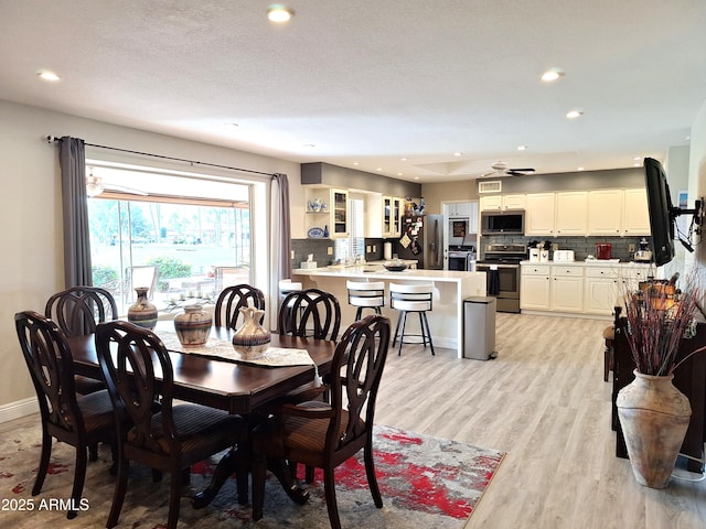 dining room featuring light wood-type flooring