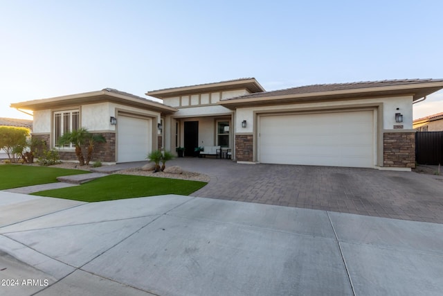 prairie-style home with a garage