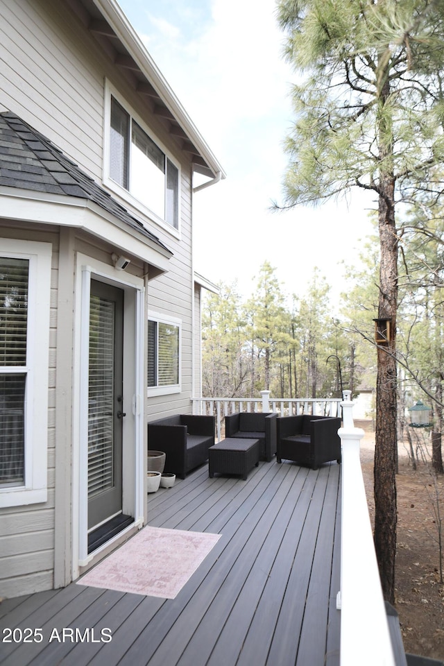 deck with an outdoor hangout area