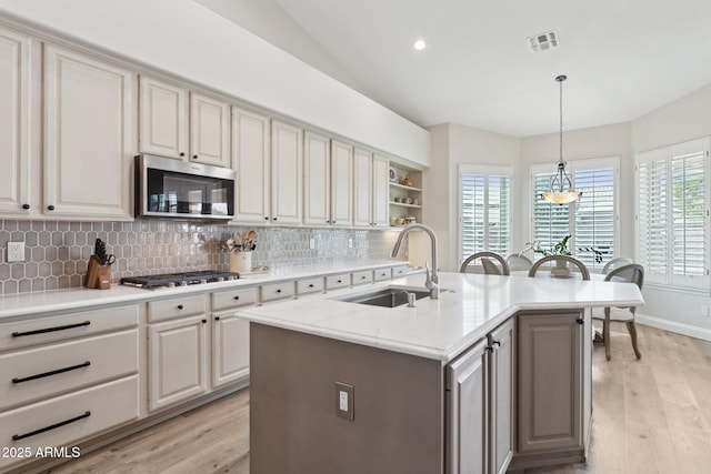 4960 E Dale Ln, Cave Creek, AZ 85331 - kitchen featuring a sink, stainless steel appliances, light wood-style flooring, backsplash, and recessed lighting