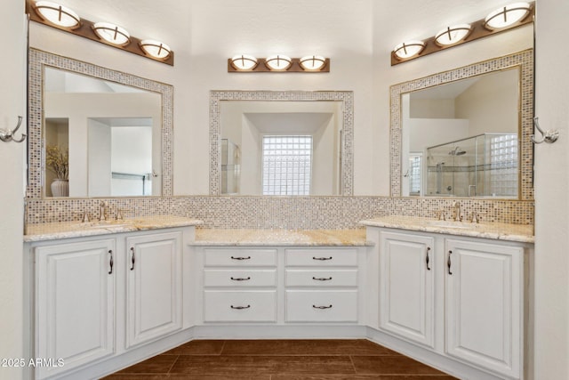 4960 E Dale Ln, Cave Creek, AZ 85331 - bathroom featuring tasteful backsplash, a shower stall, and two vanities