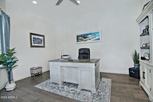 home office with dark hardwood / wood-style flooring and ceiling fan