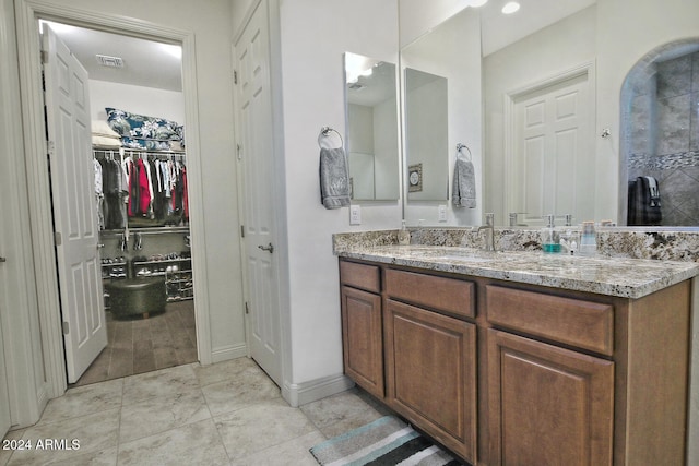 bathroom featuring hardwood / wood-style flooring and vanity