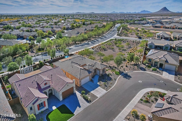 birds eye view of property featuring a mountain view