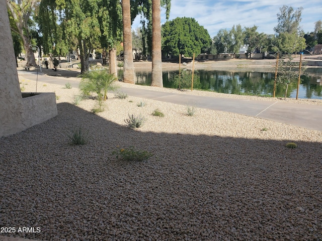 view of yard with a water view