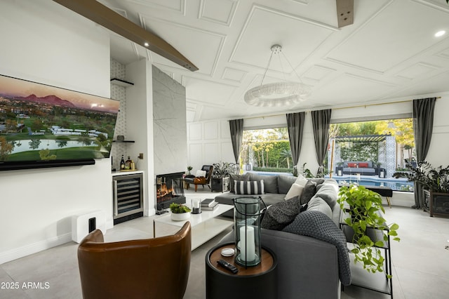 interior space featuring wine cooler and a fireplace