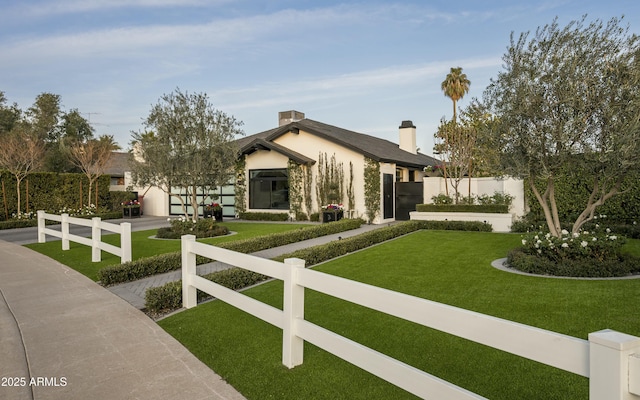 view of front of house with a front lawn