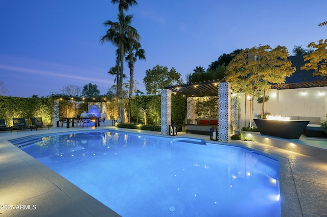 pool at dusk with an outdoor living space and a patio