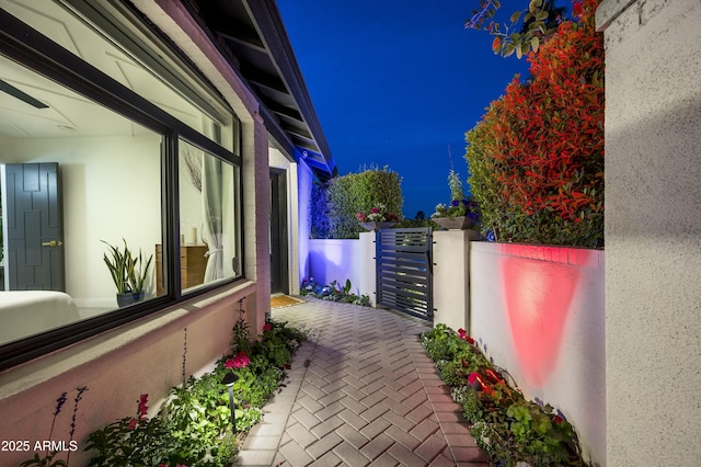 view of property exterior at twilight