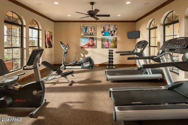 exercise room with ceiling fan and ornamental molding