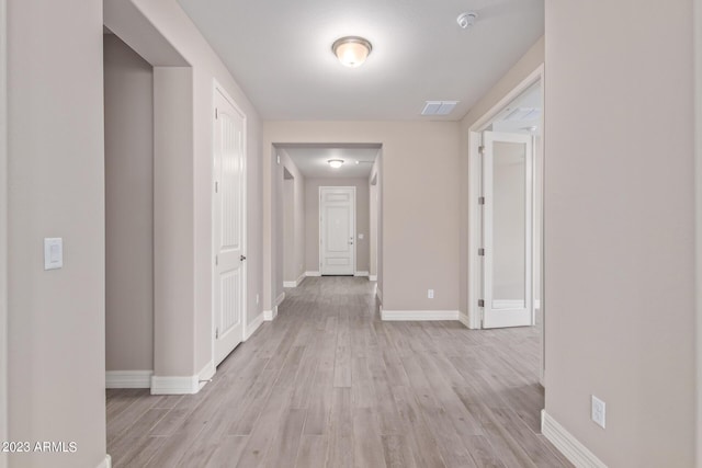 corridor featuring light wood-type flooring