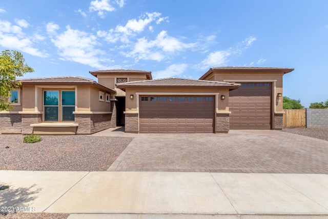 prairie-style house featuring a garage