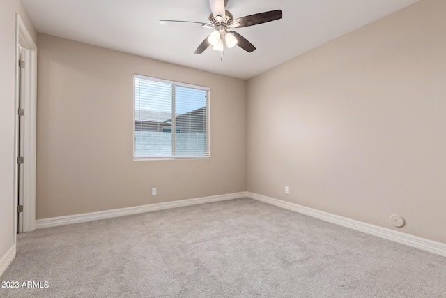 unfurnished room featuring carpet flooring and ceiling fan