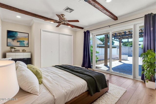737 E 7th Pl, Mesa, AZ 85203 - bedroom with access to exterior, beam ceiling, light wood-type flooring, recessed lighting, and a closet