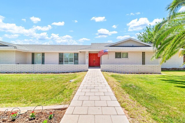737 E 7th Pl, Mesa, AZ 85203 - ranch-style house with brick siding and a front yard