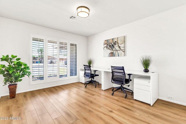 737 E 7th Pl, Mesa, AZ 85203 - office space featuring light wood-style flooring and baseboards