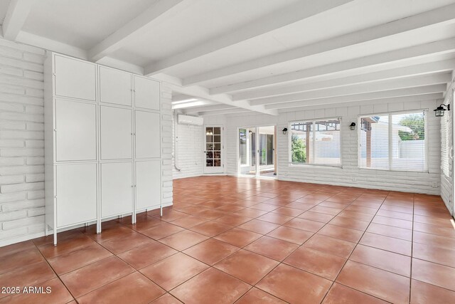 737 E 7th Pl, Mesa, AZ 85203 - unfurnished sunroom with beamed ceiling and a wall mounted air conditioner
