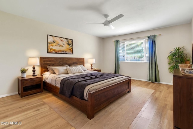 737 E 7th Pl, Mesa, AZ 85203 - bedroom featuring light wood-type flooring, baseboards, and a ceiling fan
