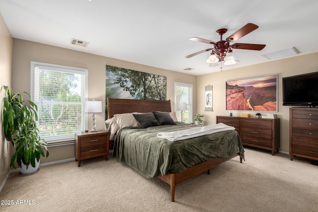 5612 S 21st Pl, Phoenix, AZ 85040 - bedroom with light colored carpet, baseboards, and ceiling fan